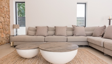 Resa estate modern villa for sale ibiza first line north sofa.jpg